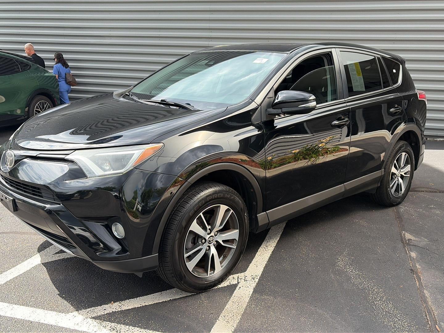 2018 Toyota RAV4 XLE in Black — front three-quarter view