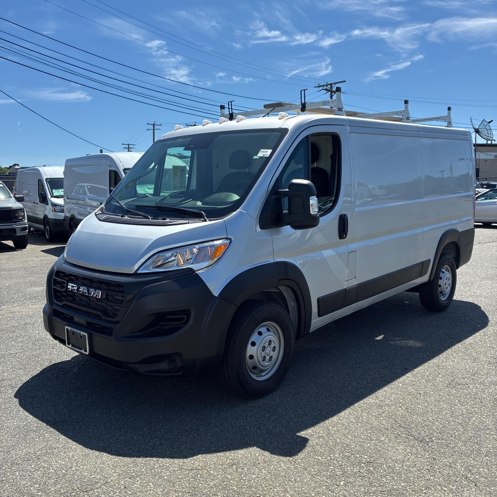 2023 RAM ProMaster Cargo Van 3500 136 WB in Bright Silver Metallic Clearcoat — front three-quarter view