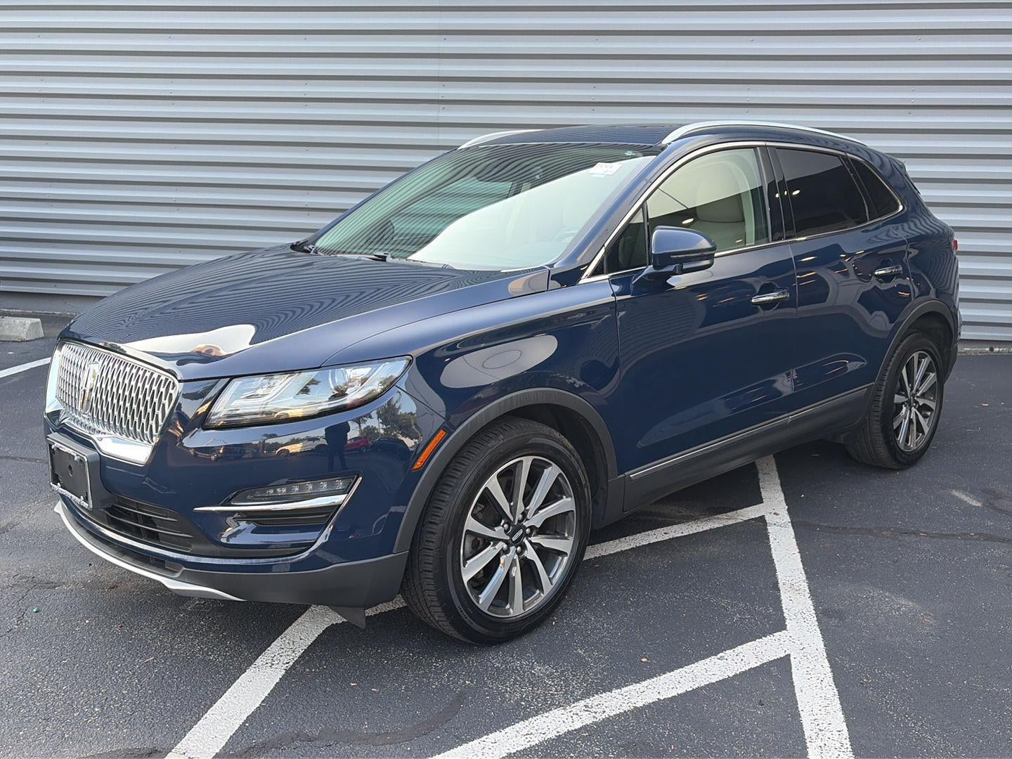 2019 Lincoln MKC Reserve in Rhapsody Blue Metallic — front three-quarter view